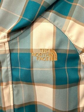 The North Face Turquoise Plaid Ski Jacket with Gold Logo